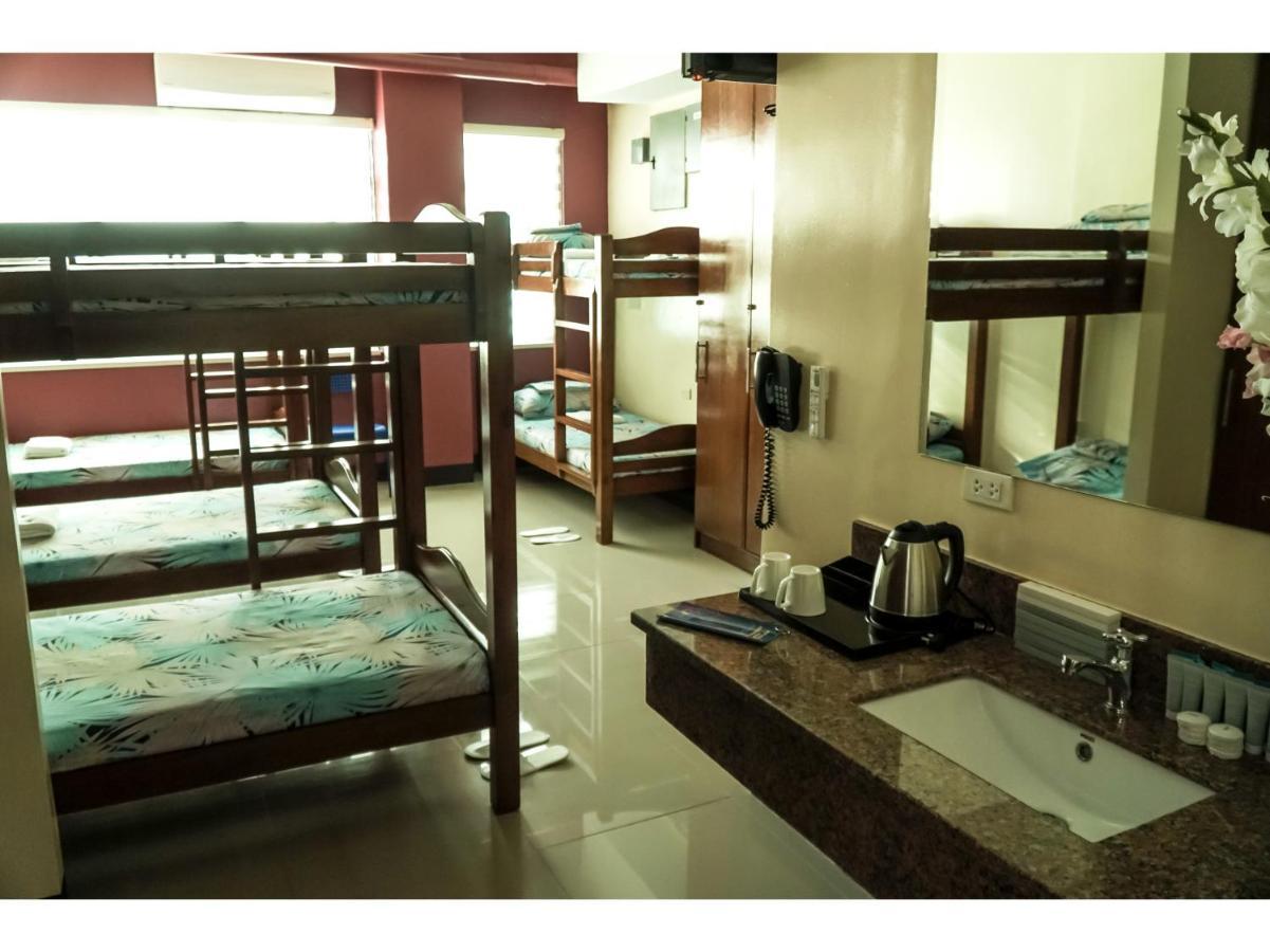 M28 Hotel And Apartments ケソンシティ エクステリア 写真